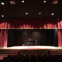 Open Stage Curtains with Piano